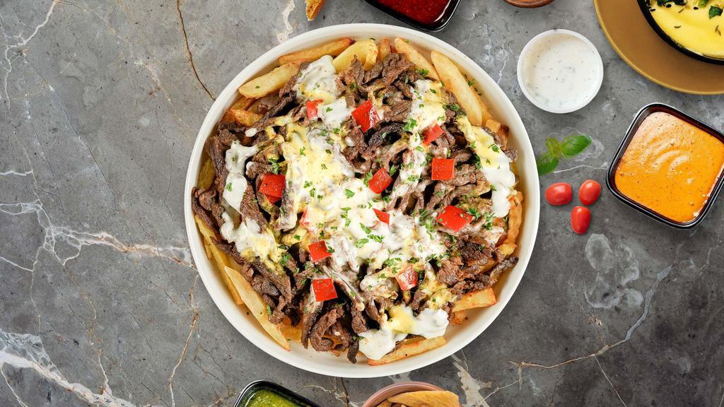 Proud Philly Loaded Fries · Steak, caramelized onions, bell peppers, and melted cheese topped on Idaho potato fries.