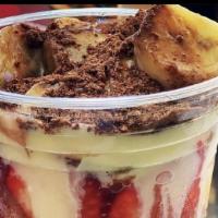 Cholado · Shaved ice, 100% natural fruit syrup, strawberry, mango, pineapple, banana. kiwi topped with...