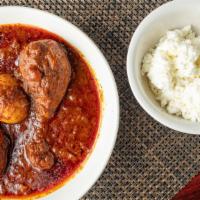 Doro Wat · Traditional dish chicken stew simmered in berbere red pepper sauce with garlic onion and her...