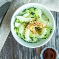 Cucumber Salad · Thin sliced cucumber and seaweed in sweet ponzu dressing.