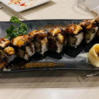 Lol · Shrimp tempura, spicy tuna, topped with eel, sesame sauce, eel sauce.