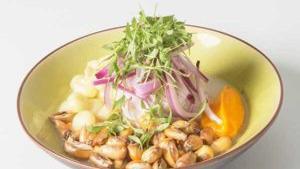 Corvina Ceviche · Fish marinated in fresh tiger's milk mixed with red onions, cilantro, fresh corn. toasted co...