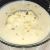 Rasmalai · Sweet, spongy cottage cheese dumplings, flavored with cardamom and rose water.