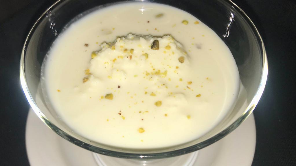 Rasmalai · Sweet, spongy cottage cheese dumplings, flavored with cardamom and rose water.