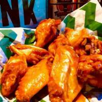 10 Wings · Ten wings.  Fried to perfection and tossed in your choice of our delicious wing sauces or BB...