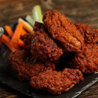 Bone-In Nashville Hot Wings · 8 piece Nashville hot wings - medium heat. Come with 8  classic style bone-in wings, carrots...