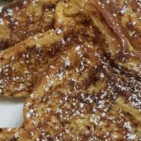 Franky'S Famous French Toast · Served with powdered sugar, and side of syrup.