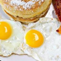 2-2-2 All Star Breakfast · Two eggs any style, served with two pancakes or two French toasts, and two slices bacon.