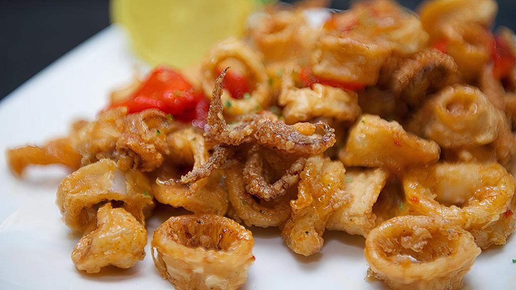 Calamari · Lightly fried, with sweet and spicy asian chili sauce