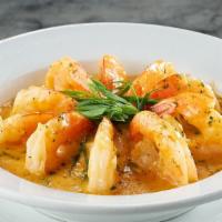 Barbecued Shrimp · large shrimp sautéed in reduced white wine, butter, garlic & spices on a bed of roasted garl...