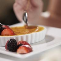 Creme Brulee  · Classic creole vanilla custard, fresh berries