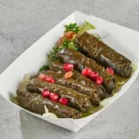 Grape Leaves · 6 Grappe Leaves stuffed with ground meat and rice, seasoned and flavored with Arabic spices ...