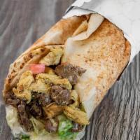 Mixed Shawarma · Chicken and Beef marinated with Arabic Spices, roasted and served in pita bread with Lettuce...