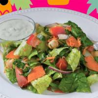House Salad · Romaine lettuce, tomatoes, cucumbers, red onions, and croutons