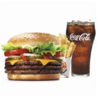 Triple Whopper® With Cheese Meal · Our Triple Whopper Sandwich features three ¼ lb* savory flame-grilled beef patties topped wi...