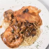 Chicken Marsala · Chicken cutlet sauteed with mushrooms and marsala wine. Served over linguini.