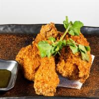 Blue Ribbon Fried Chicken · Our famous fried chicken. 1/2 a chicken breaded and fried, dusted with chili powder and serv...