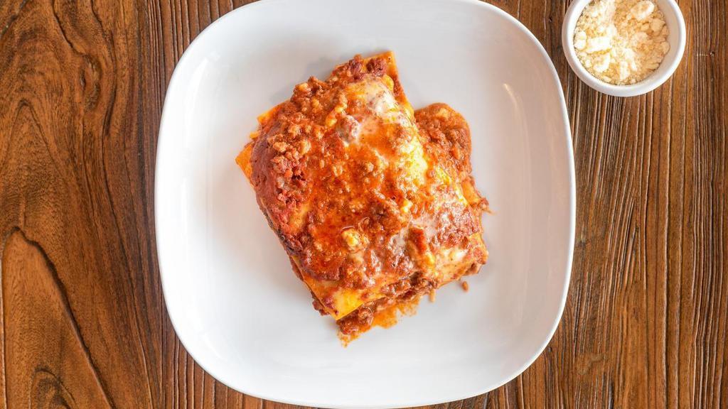 Original Lasagna · Classic bolognese, mozzarella, béchamel, parmesan cheese.