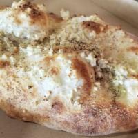 Focaccia And Garlic · homemade bread, olive oil, parmesan cheese, black pepper, garlic