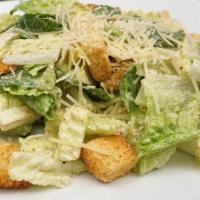 *Caesar Salad*. · Chopped Romaine & thick Croutons tossed in Caesar Dressing & topped with Shredded Parmesan. ...