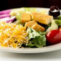 *House Salad* · Mixed Salad Greens topped with Grape Tomatoes, Cucumbers, Red Onion, Cheddar-jack Cheese & C...