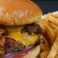 *The American* · Two 4oz Angus Beef Smash Patties with American Cheese, Bacon & a Fried Egg over easy.  Serve...