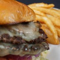 *Swiss Mushroom* · Two 4oz Angus Beef Smash Patties topped with Swiss Cheese & Sautéed Mushrooms.  Served on a ...