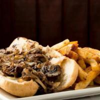 *Steak Philly* · Certified Angus Beef shaved thin & grilled with Onions & Mushrooms.  Served in a Hoagie with...