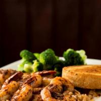 *Cajun Shrimp* · Jumbo Shrimp flat-grilled with Cajun Spices & Butter served over Jasmine Rice.  Side Items N...