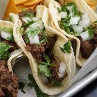 *Street Tacos* · Choose Corn or Flour Tortillas.  Select Steak, Chicken, Shrimp, or Barbacoa Tacos.  Topped w...