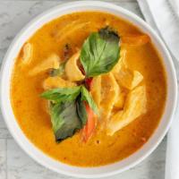 Panang Curry · peanut butter, bell peppers, and shredded lime leaf on top.