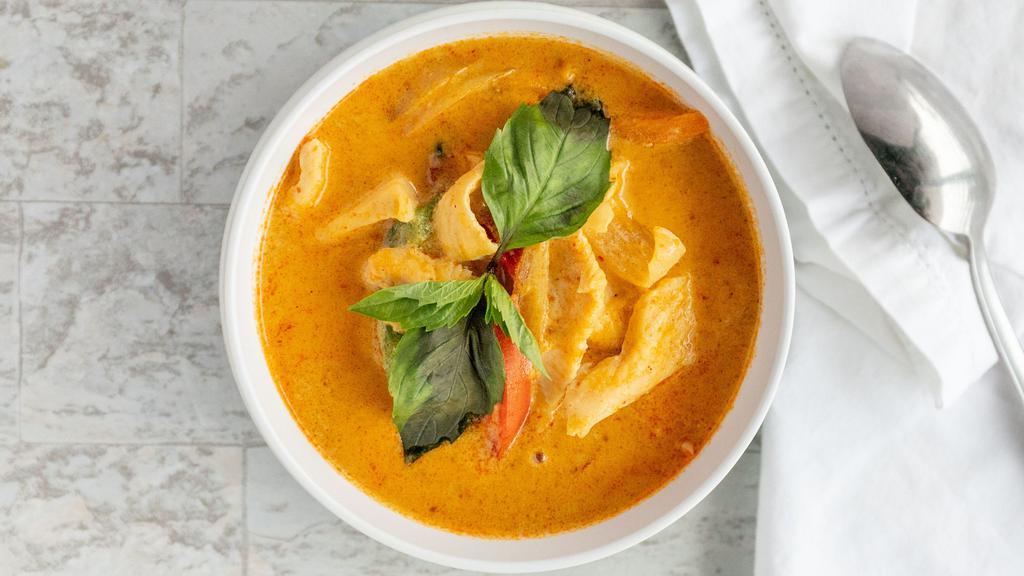 Panang Curry · peanut butter, bell peppers, and shredded lime leaf on top.