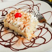 Tres Leches · Sponge cake Sooked with a mixture of three milks.