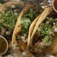 Bohemian Tacos · Most popular. With pineapple salsa, cilantro, and onions.