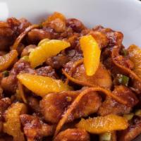 Orange Peel Chicken · Tossed with fresh orange peel and chili peppers for a spicy/citrus combination