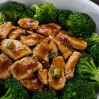 Ginger Chicken With Broccoli · Served Cantonese style on a bed of fresh steamed broccoli.