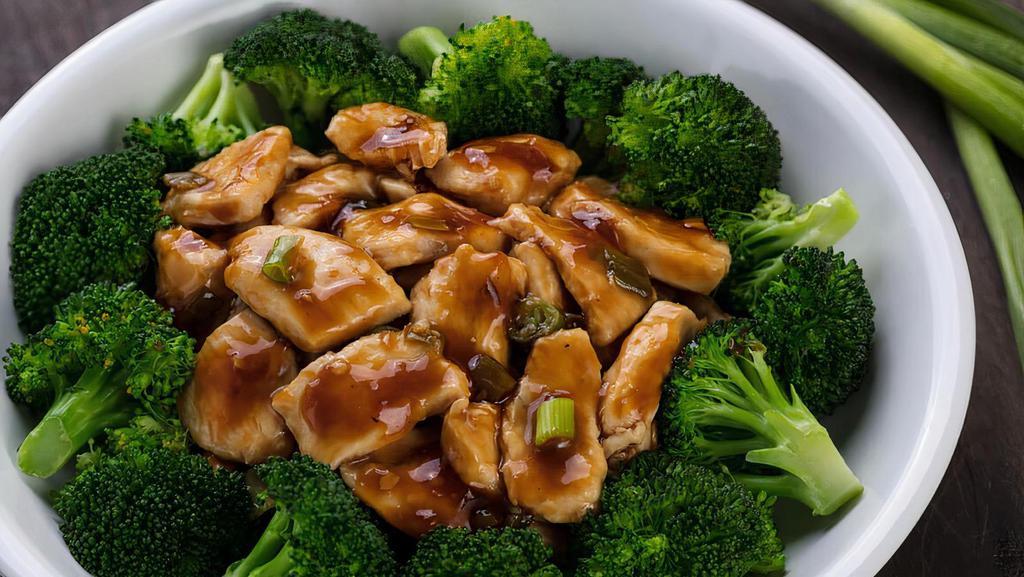 Ginger Chicken With Broccoli · Served Cantonese style on a bed of fresh steamed broccoli.