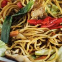 Kids Lo Mein Chicken · Soft noodles and slivered vegetables in a spicy vegetarian sauce