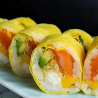Mango Roll · soy paper, salmon, fresh mango, tempura flakes, cream cheese and avocado.