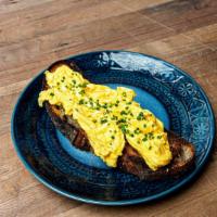 Soft Scrambled Egg Toast · Vegetarian. Soft scrambled eggs*, chives, sourdough. *Contains undercooked eggs. Consuming r...