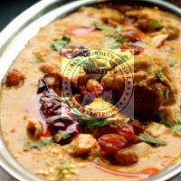 Shahi Chicken Korma · Tender cubes of chicken in delicious creamy gravy with a distinctive coriander and cumin fla...