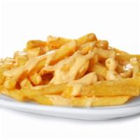 Large Cheese Fries · Fresh batch of french fries topped with melted cheese and pieces of bacon with ranch on the ...