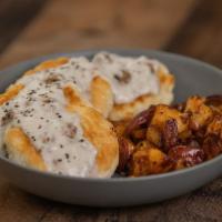 Biscuits & Gravy · Grilled buttermilk biscuits, sliced and served with sausage gravy for dipping served with a ...