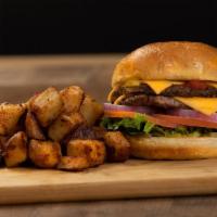 The Double Stack Burger · A steak burger with American cheese, lettuce, tomato, red onions, mustard, ketchup and dill ...