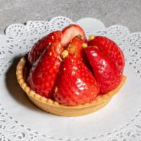 Strawberry Pistachio Tart · Strawberry tart sprinkled with pistachios on French vanilla custard.