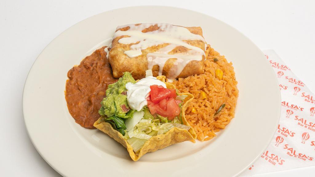 Classic Chimichanga · A flour tortilla deep-fried and filled with your choice of meat and topped with melted white cheese. Served with lettuce, rice, beans, guacamole, sour cream salad.
