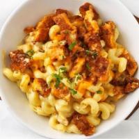 Fajita Mac · Grilled onions & peppers on top of cavatappi noodles with homemade cheese  sauce.