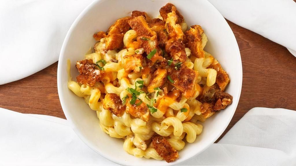 Buffalo Chicken Mac · Crispy chicken tossed in buffalo sauce on top of cavatappi noodles with homemade cheese sauce.