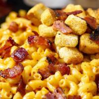 Bacon Lover’S Mac & Cheese · Bacon on top of cavatappi noodles with homemade cheese sauce.