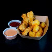 Kid'S Chicken Tenders · crisp tenders and tater tots served with ketchup and velvet sauce (Optimist Hall doesn’t com...
